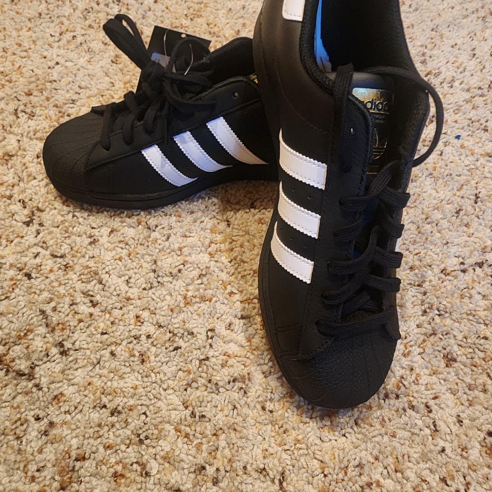 Adidas Black Sneakers with White Stripes